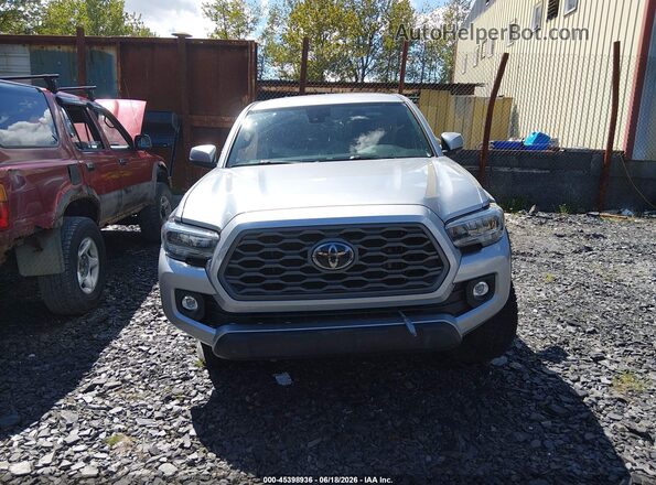 3TMCZ5AN8PM622511 2023 TOYOTA TACOMA Silver Սալոնի հետևի տեսք