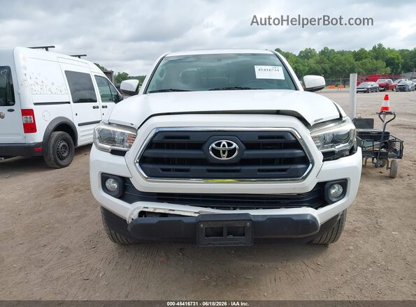3TMCZ5AN9GM013900 2016 TOYOTA TACOMA White Vista del cuadro de instrumentos