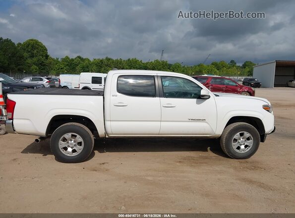 3TMCZ5AN9GM013900 2016 TOYOTA TACOMA White Vista interior trasera