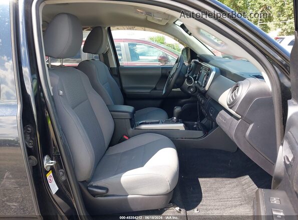 3TMCZ5AN9KM281645 2019 TOYOTA TACOMA Black Widok wnętrza z przodu