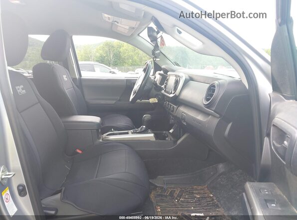 3TMCZ5AN9LM307730 2020 TOYOTA TACOMA Silver Front interior view