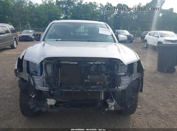 3TMCZ5AN9LM307730 2020 TOYOTA TACOMA Silver Rear interior view