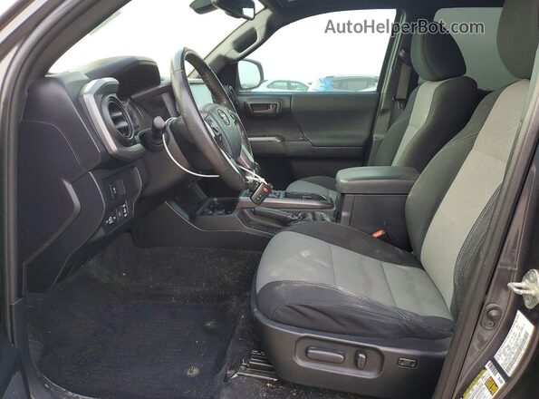 3TMCZ5AN9LM359309 2020 TOYOTA TACOMA Charcoal Front interior view
