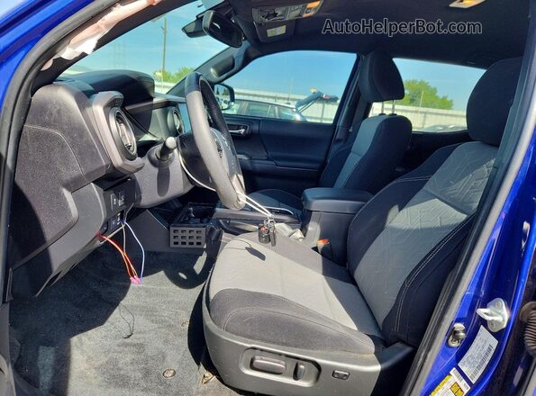 3TMCZ5AN9PM579703 2023 TOYOTA TACOMA Blue Vista interior delantera