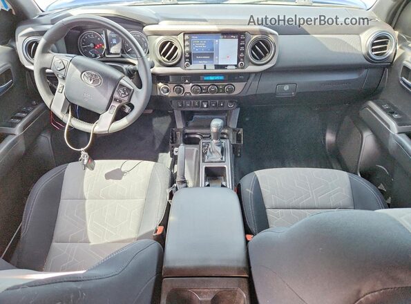 3TMCZ5AN9PM579703 2023 TOYOTA TACOMA Blue Vista del salpicadero