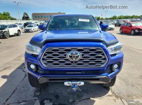3TMCZ5AN9PM579703 2023 TOYOTA TACOMA Blue Vista frontal