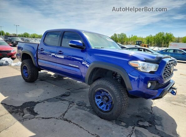3TMCZ5AN9PM579703 2023 TOYOTA TACOMA Blue Delantero derecho