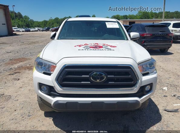 3TMCZ5AN9PM630830 2023 TOYOTA TACOMA White Սարքավորումների վահանակի տեսք