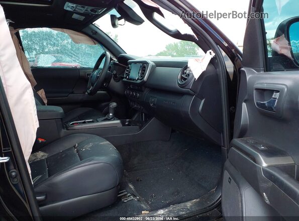 3TMCZ5AN9PM650690 2023 TOYOTA TACOMA Black Front interior view