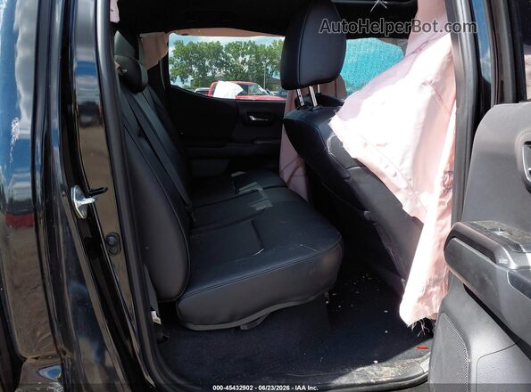 3TMCZ5AN9PM650690 2023 TOYOTA TACOMA Black VIN sticker view