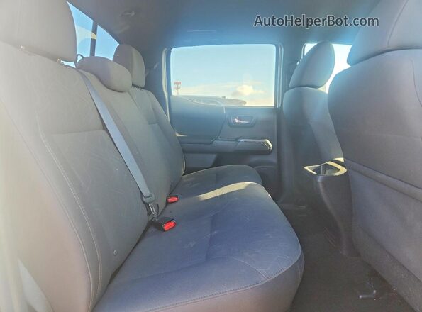 3TMCZ5ANXKM240702 2019 TOYOTA TACOMA White Rear seats view
