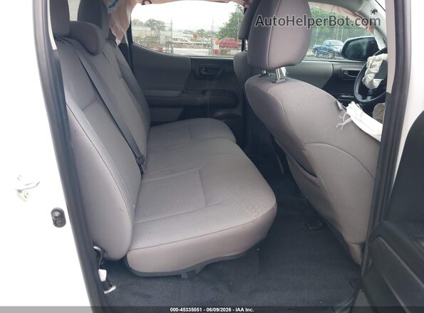 3TMCZ5ANXPM600364 2023 TOYOTA TACOMA White VIN կոդի պիտակի տեսք