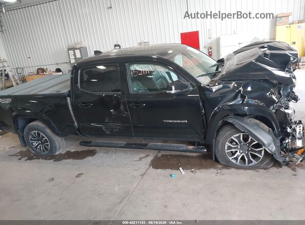 3TMDZ5BN3MM114073 2021 TOYOTA TACOMA Black Вид задньої частини салону