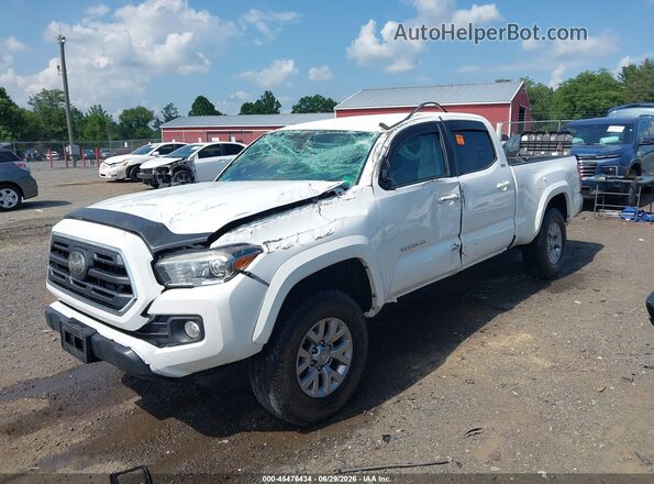 3TMDZ5BN6JM036769 2018 TOYOTA TACOMA White წინა მარცხენა ხედი სამი მეოთხედიდან