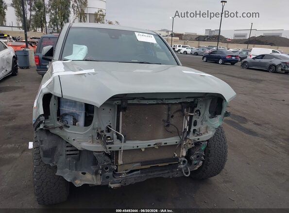 3TMDZ5BN9PM144263 2023 TOYOTA TACOMA Зеленый Вид задней части салона