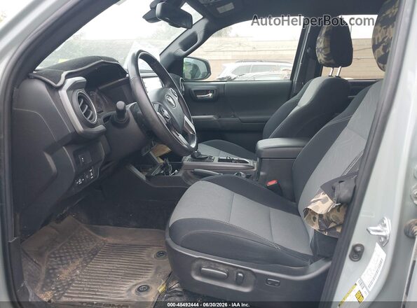 3TMDZ5BN9PM144263 2023 TOYOTA TACOMA Зеленый Вид салона спереди