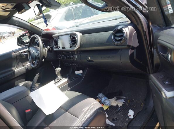 3TMGZ5AN0MM392508 2021 TOYOTA TACOMA Gray Vista interior delantera