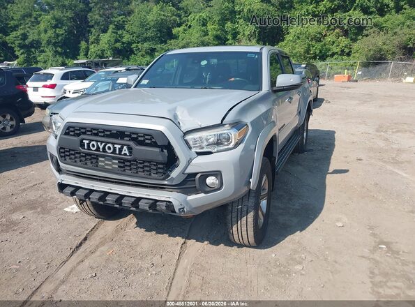 3TMGZ5AN1JM159006 2018 TOYOTA TACOMA Light Blue Передняя левая четверть