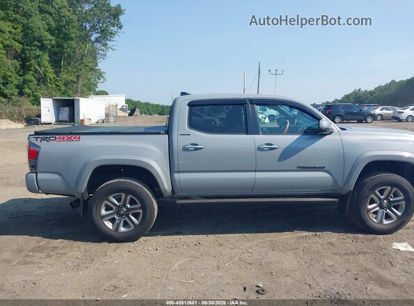 3TMGZ5AN1JM159006 2018 TOYOTA TACOMA Light Blue Вид задней части салона