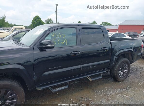 3TMGZ5AN1MM379671 2021 TOYOTA TACOMA 4WD Black Widok z przodu
