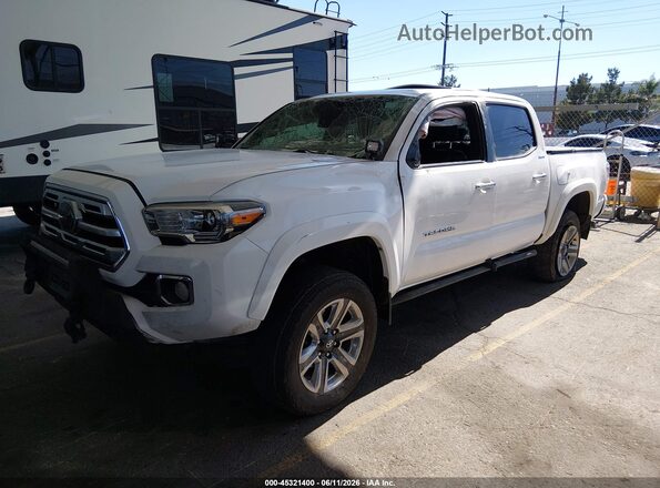 3TMGZ5AN2JM167857 2018 TOYOTA TACOMA Белый Передняя левая четверть