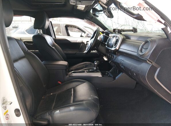3TMGZ5AN2JM167857 2018 TOYOTA TACOMA Белый Вид салона спереди