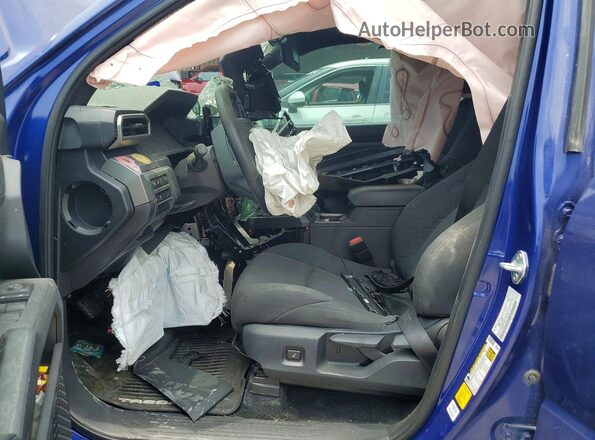 3TMKB5FN4RM004002 2024 TOYOTA TACOMA Blue Widok wnętrza z przodu