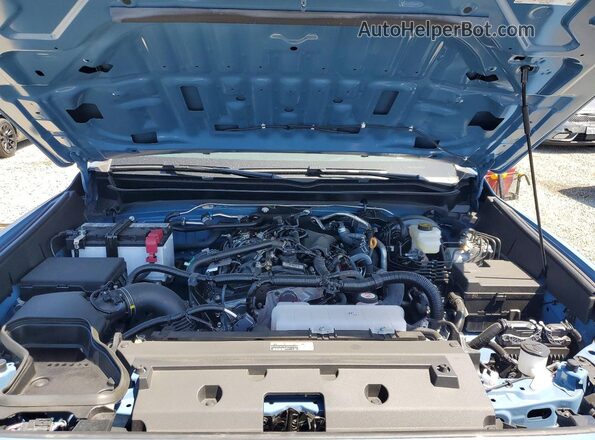 3TMKB5FN8TM058927 2026 TOYOTA TACOMA Blue Rear interior view