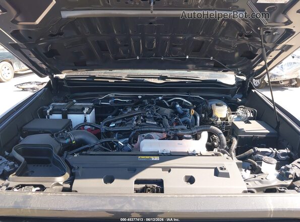 3TMKB5FN9SM052083 2025 TOYOTA TACOMA 2WD Gray Rear view