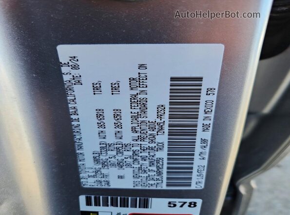 3TMLB5JN0RM052558 2024 TOYOTA TACOMA Silver Շարժիչի բաժամունքի տեսք