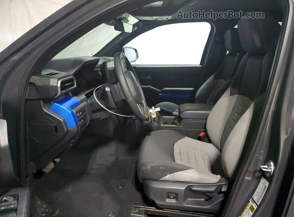 3TMLB5JN1SM147085 2025 TOYOTA TACOMA Charcoal Vista interior delantera