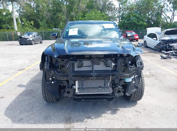 3TMLB5JN1TM232543 2026 TOYOTA TACOMA Black Вид задньої частини салону