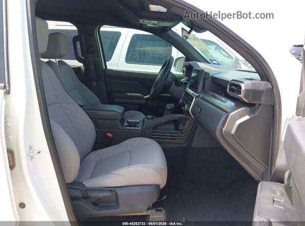 3TMLB5JN6SM168935 2025 TOYOTA TACOMA White წინა სალონის ხედი