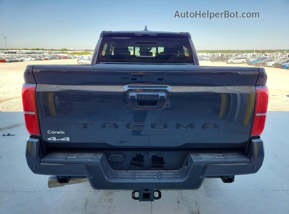 3TMLB5JN9TM234105 2026 TOYOTA TACOMA Black Rear view