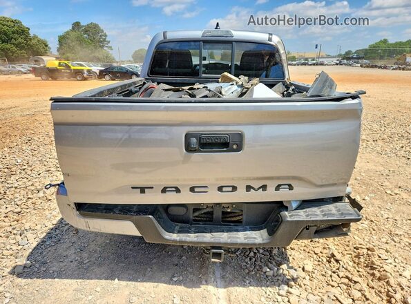 3TYAX5GN0NT063140 2022 TOYOTA TACOMA Silver Widok z tyłu