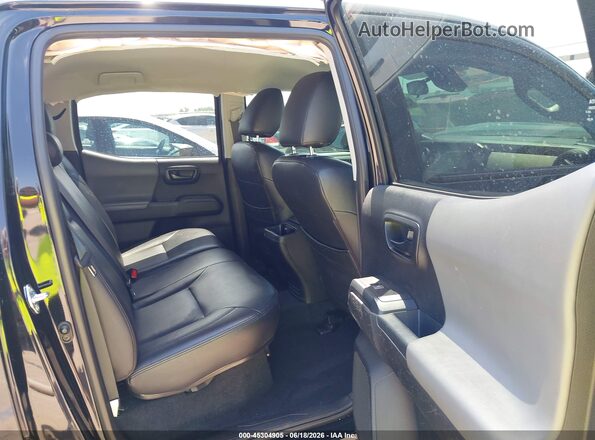 3TYAX5GN9MT023833 2021 TOYOTA TACOMA Black VIN sticker view