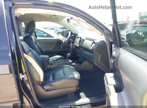3TYAX5GN9MT023833 2021 TOYOTA TACOMA Black Front interior view