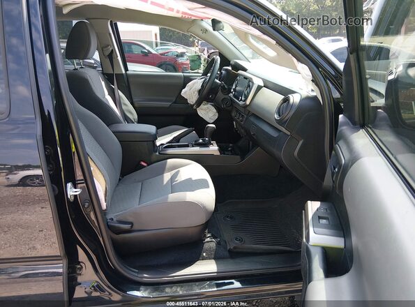 3TYAX5GNXMT024389 2021 TOYOTA TACOMA Black Front interior view