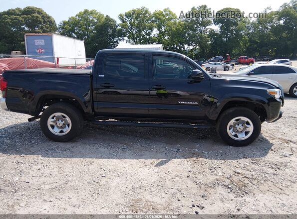 3TYAX5GNXMT024389 2021 TOYOTA TACOMA Black Rear interior view