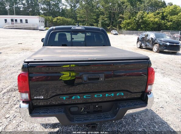 3TYAX5GNXMT024389 2021 TOYOTA TACOMA Black 