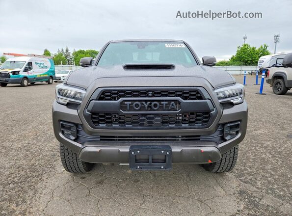 3TYCZ5AN4PT113195 2023 TOYOTA TACOMA Коричневый Вид спереди