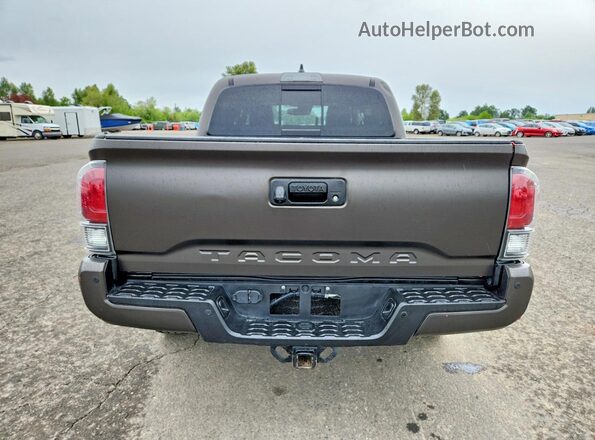 3TYCZ5AN4PT113195 2023 TOYOTA TACOMA Коричневый Вид сзади