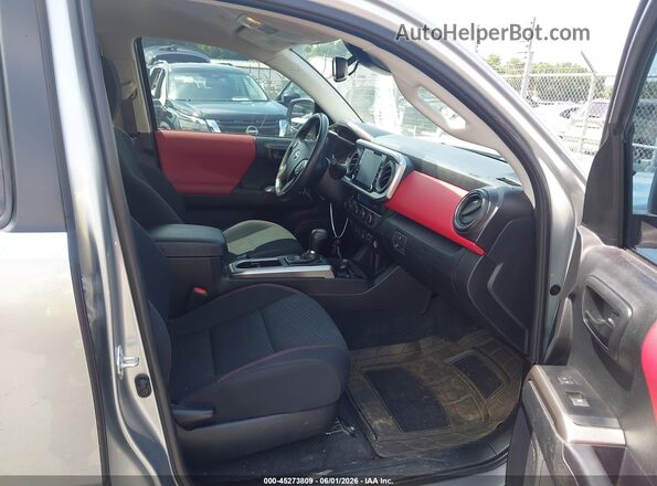 3TYCZ5AN5PT169128 2023 TOYOTA TACOMA Silver წინა სალონის ხედი