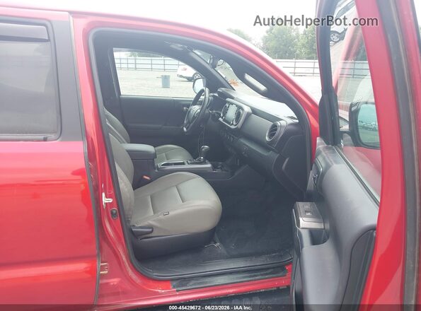 3TYCZ5AN6PT172684 2023 TOYOTA TACOMA Red Вид салону спереду