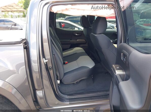 3TYCZ5AN7PT136857 2023 TOYOTA TACOMA Gray VIN կոդի պիտակի տեսք