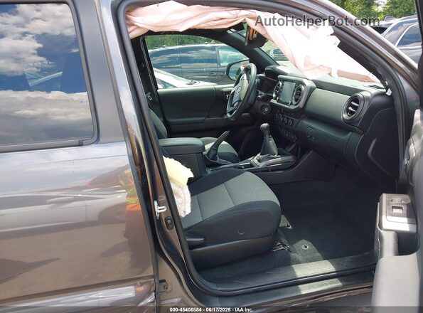 3TYCZ5AN7PT136857 2023 TOYOTA TACOMA Gray Սալոնի դիմացի տեսք
