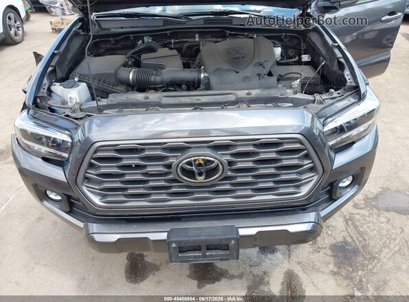 3TYCZ5AN7PT136857 2023 TOYOTA TACOMA Gray Հետևի տեսք