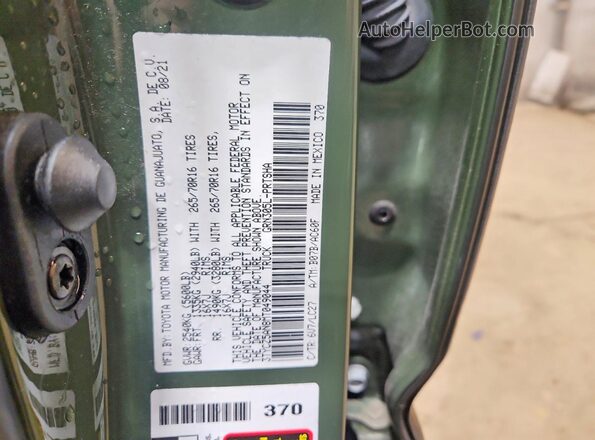 3TYCZ5AN8MT049044 2021 TOYOTA TACOMA Green Engine compartment view