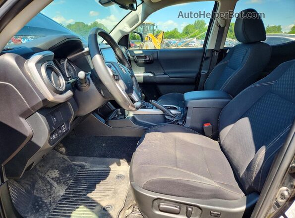 3TYCZ5AN9PT117145 2023 TOYOTA TACOMA Black Вид салону спереду