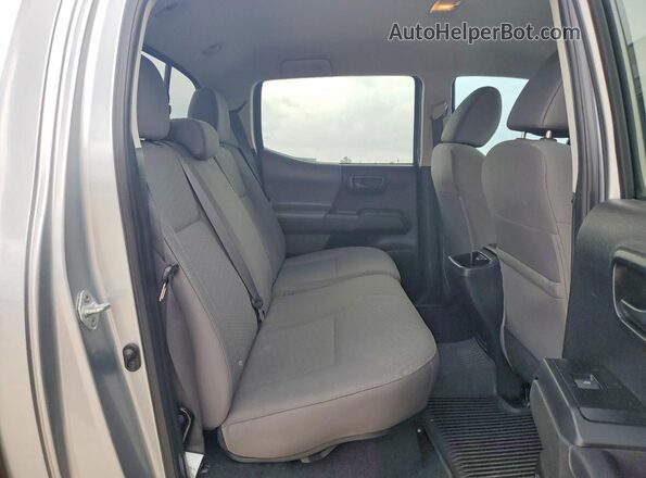 3TYCZ5AN9PT147522 2023 TOYOTA TACOMA Silver Вид задньої частини салону